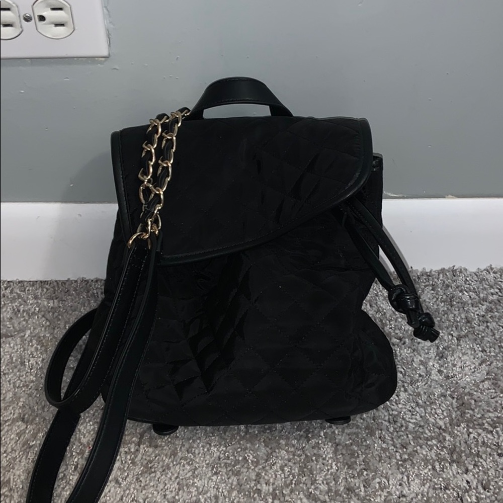 Black quilted mini backpack